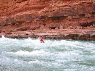 Joel is running the North Canyon Rapid in this inflatable kayak.  It looks pretty exciting and a little scary.